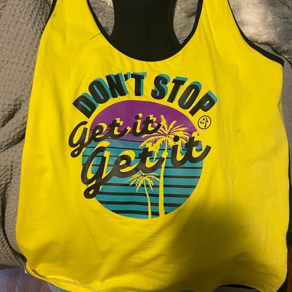 XXLovely Zumba tank it is too big for me now. Worn only a couple of times. - Picture 1 of 3
